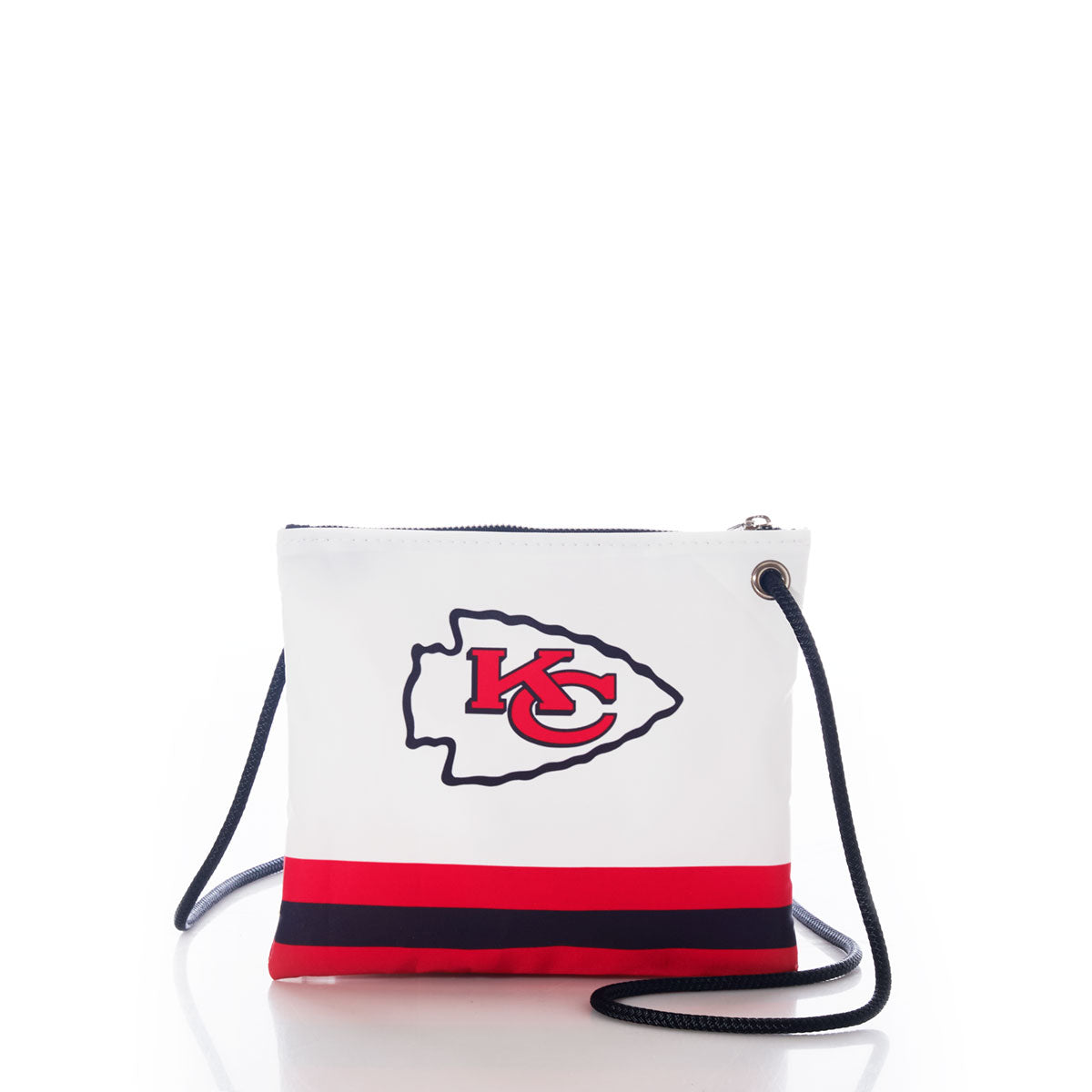 Sea Bags Kansas City Chiefs Slim Crossbody—a small, sustainable white bag with a Kansas City Chiefs logo, accented by red and black bottom stripes and a black shoulder strap, shown against a white background. by Sea Bags