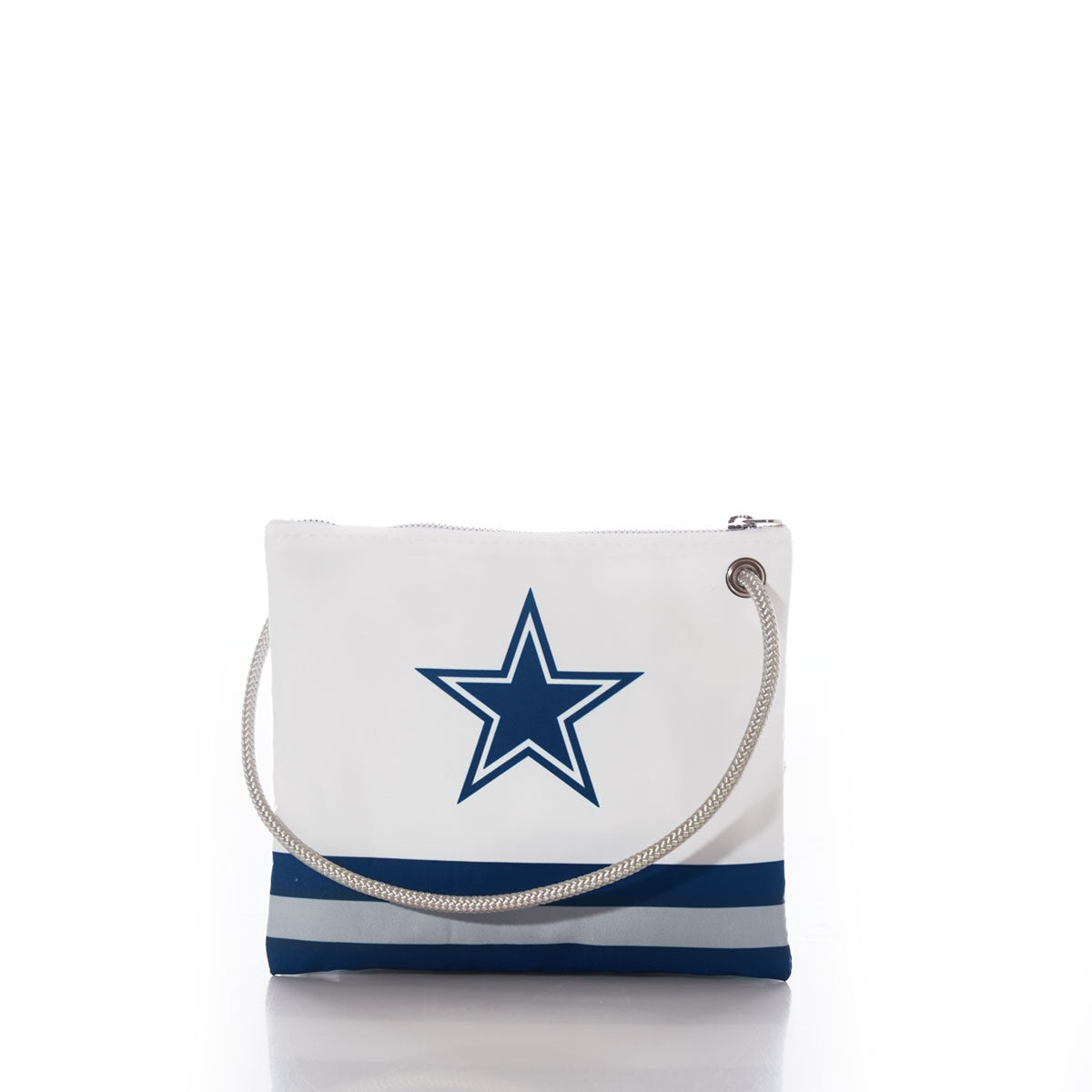 Expertly crafted from recycled sail cloth, the Sea Bags Dallas Cowboys Slim Crossbody features a white design with a blue star logo, blue horizontal stripes at the bottom, and a silver rope handle. This versatile bag—displayed here on a white background—can be carried as a pouch or worn as a crossbody. by Sea Bags