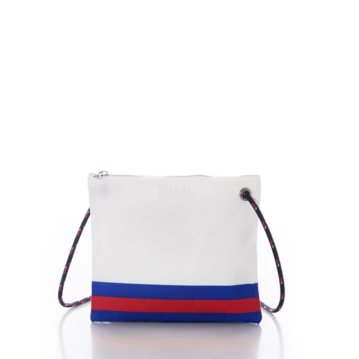 Buffalo Bills Slim Crossbody by Sea Bags, a handcrafted white crossbody bag made from recycled sail cloth, features a navy and red striped bottom and a multicolored rope strap. Shown on a white background, this sustainable accessory combines style with eco-conscious design. by Sea Bags