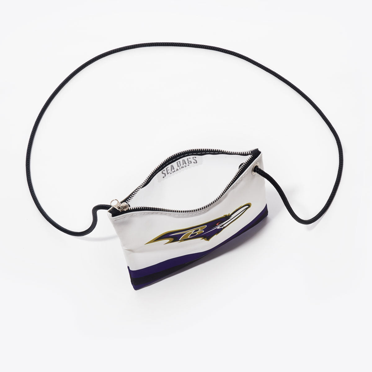 Baltimore Ravens Slim Crossbody by Sea Bags—a compact white bag made from recycled sail cloth, with a black zipper, long black strap, and the Baltimore Ravens logo—shown on a white background. by Sea Bags