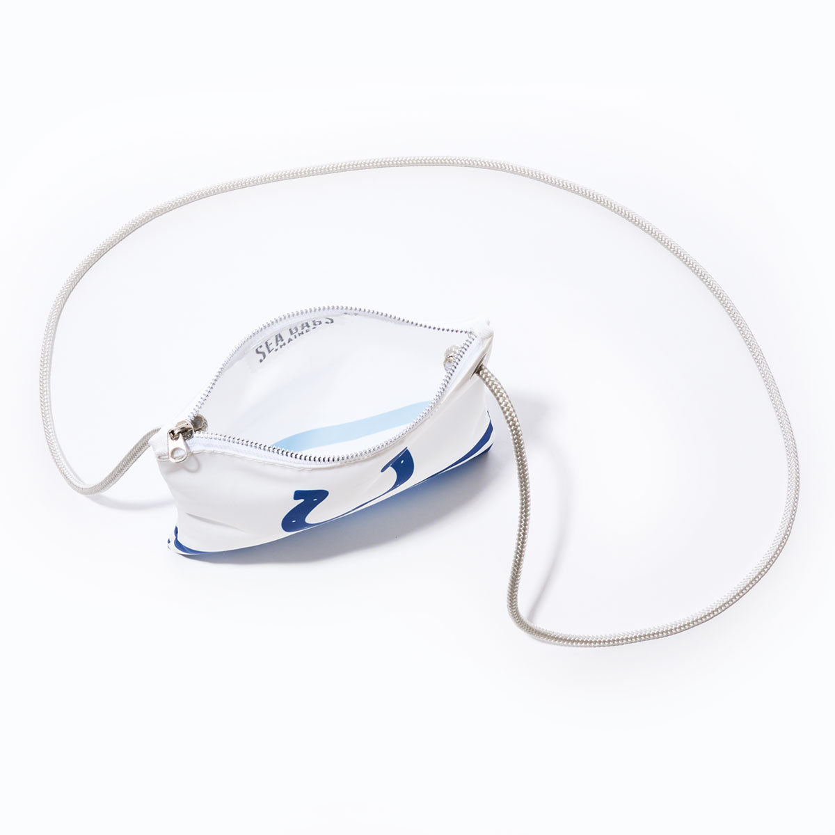 Indianapolis Colts Slim Crossbody by Sea Bags: a small white zippered pouch featuring a blue graphic and a long silver strap, crafted from recycled sail cloth, photographed on a plain white background. by Sea Bags