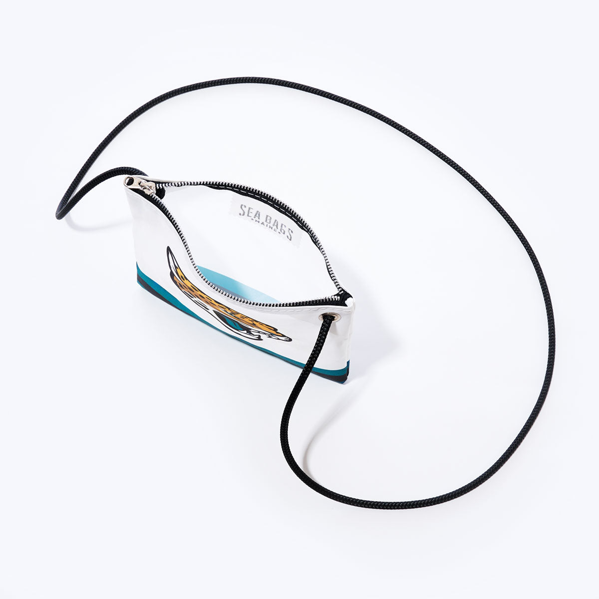Jacksonville Jaguars Slim Crossbody by Sea Bags, crafted from recycled sail cloth, features a compact white design with team logo graphics, black cord strap, zipper closure, and SEA BAGS branding printed inside the lining. by Sea Bags