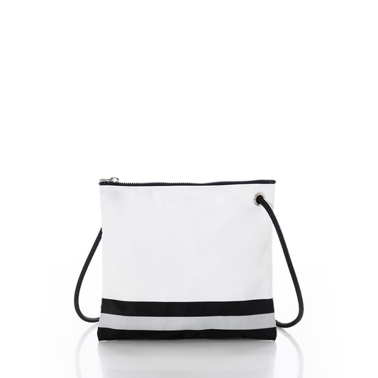 The Las Vegas Raiders Slim Crossbody by Sea Bags is a small white zippered shoulder bag made from recycled sail cloth, featuring a black strap and a black and gray stripe near the bottom, displayed on a white background. by Sea Bags