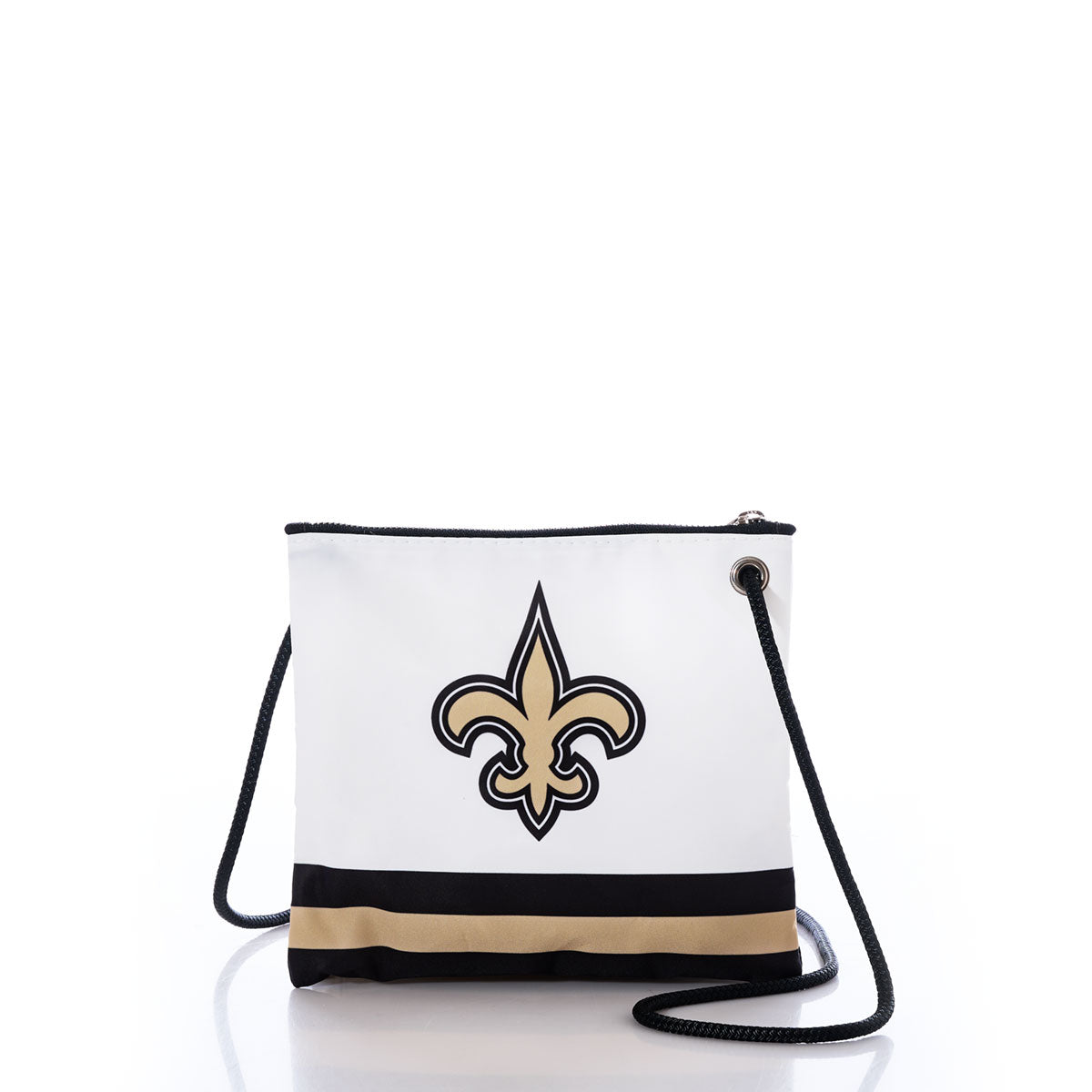 The New Orleans Saints Slim Crossbody by Sea Bags is a white crossbody bag made from recycled sail cloth, adorned with a striking black and gold fleur-de-lis emblem inspired by the iconic New Orleans Saints. It features a stylish black and gold stripe along the bottom and comes with a coordinating black strap. by Sea Bags