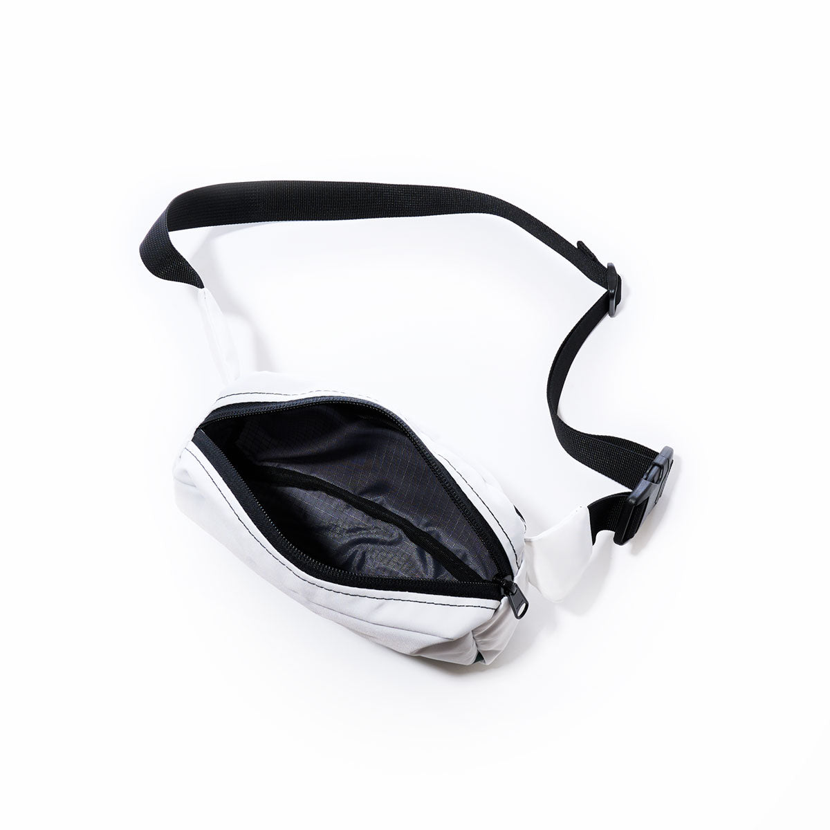 The Sea Bags Miami Dolphins Belt Bag, a white sustainable design with a black adjustable strap and a zippered main compartment, is shown open on a white background. by Sea Bags