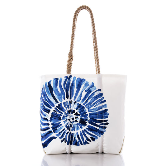 Sea Bags Nautilus Print Medium Tote, crafted from recycled sail cloth for durability and easy washing, features a striking blue ammonite shell design and sturdy brown rope handles, shown against a white background. by Sea Bags