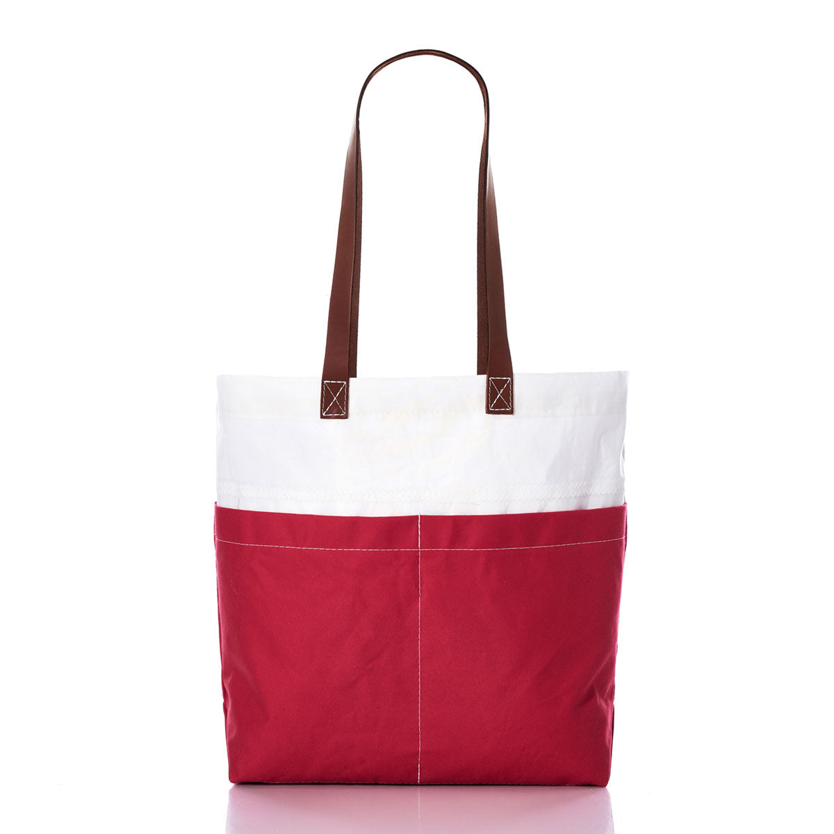 The Sea Bags Red Chebeague Market Tote, featuring brown leather handles, is crafted from recycled sails and displayed upright on a white background. by Sea Bags