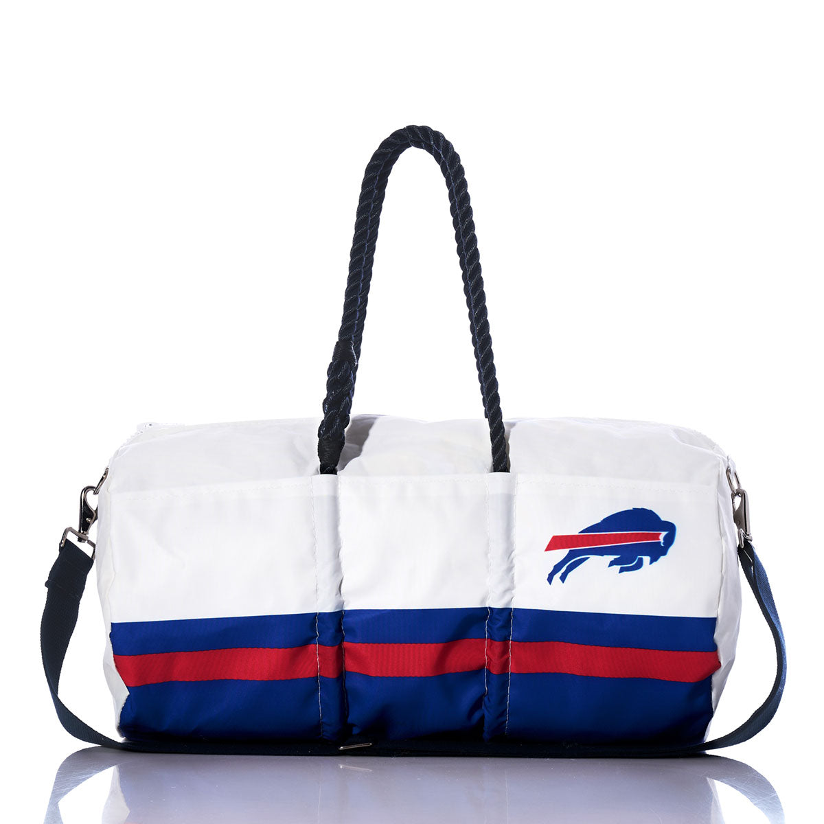Sea Bags Buffalo Bills Duffel, made from recycled sail cloth, showcases blue and red stripes, durable rope handles, a black shoulder strap, and a striking blue buffalo logo—an ideal addition for any NFL duffel collection. by Sea Bags