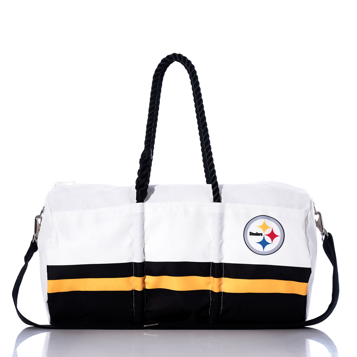 The Pittsburgh Steelers Duffel by Sea Bags is crafted from recycled sail cloth in white, black, and gold, featuring black rope handles and a detachable shoulder strap. The NFL duffel is shown against a white background. by Sea Bags