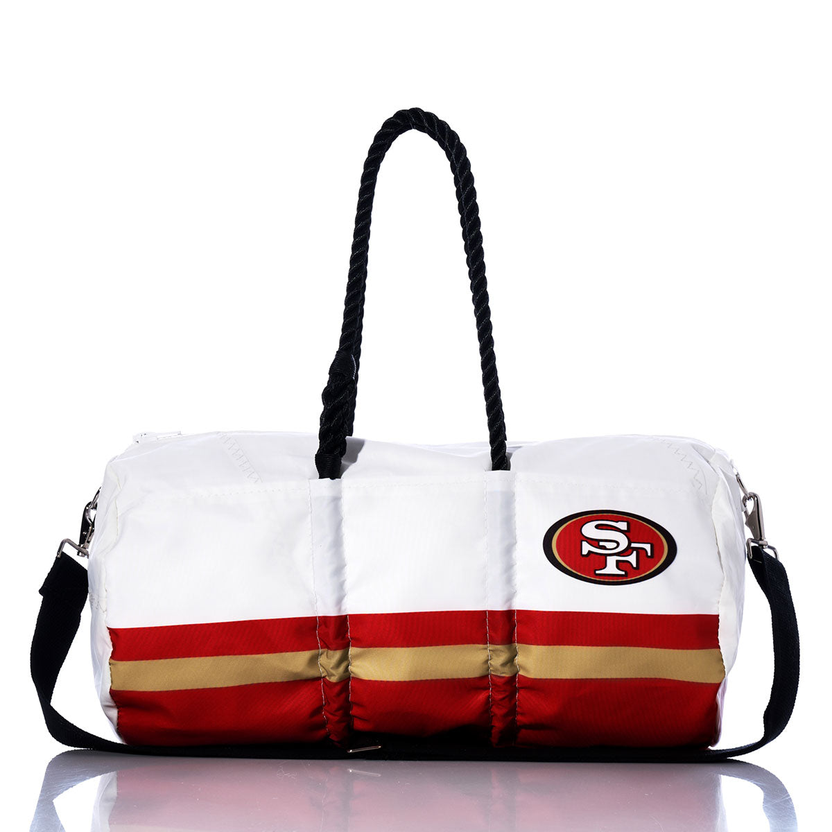 The Sea Bags San Francisco 49ers Duffel is a white duffel bag featuring red and gold stripes, black handles, and the San Francisco 49ers logo on the side, photographed against a white background. Made from recycled sail cloth, this eco-friendly bag merges sustainable style with team spirit. by Sea Bags