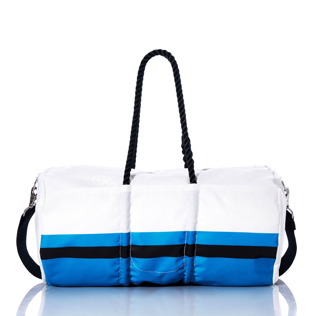 The Sea Bags Carolina Panthers Duffel features black handles and distinctive blue and black horizontal stripes near the bottom, crafted from recycled sail cloth and displayed on a reflective surface—a perfect unique NFL duffel for any Panthers fan. by Sea Bags