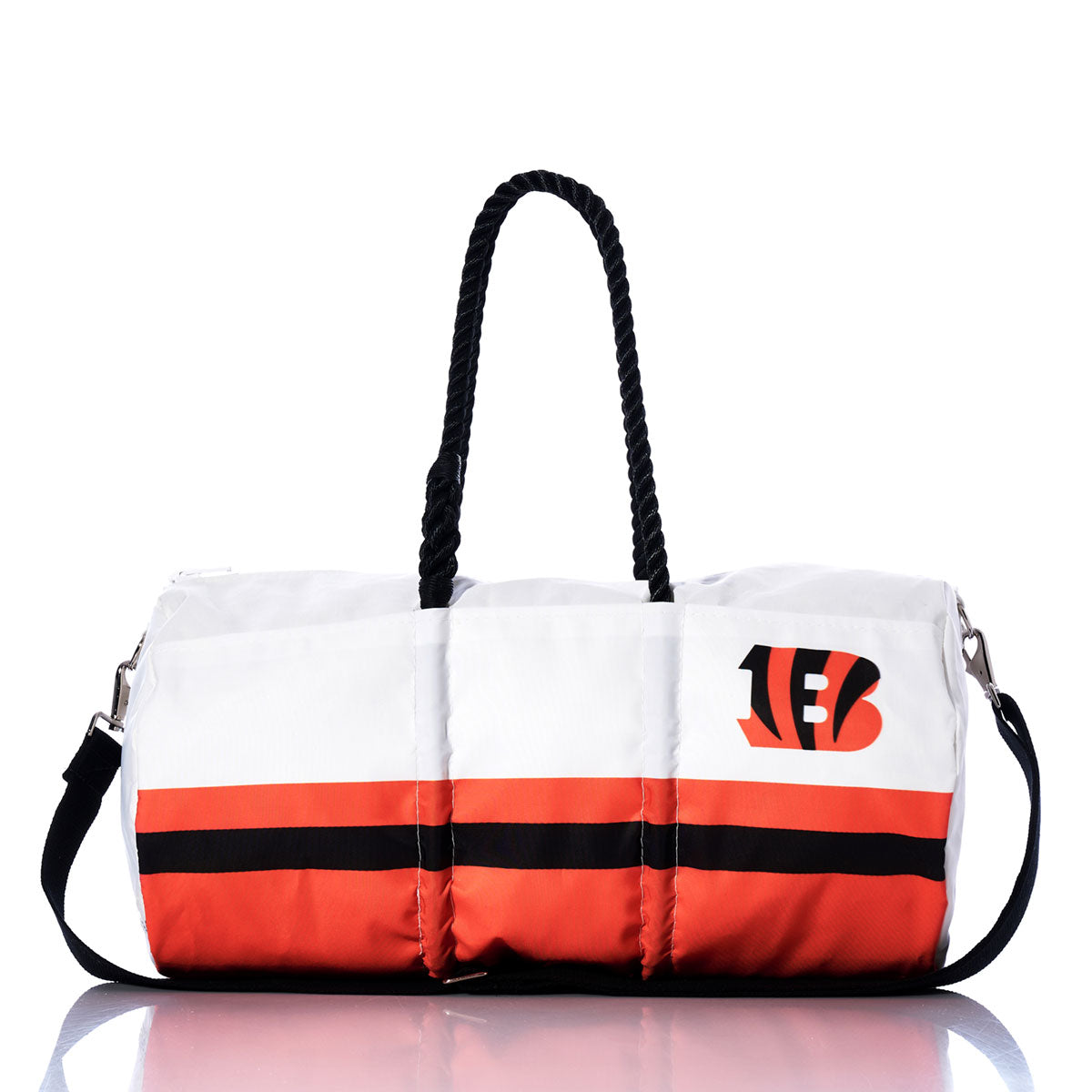 The Sea Bags Cincinnati Bengals Duffel is an eco-friendly bag made from recycled sail cloth, showcasing white, orange, and black colors. It features a rope handle, a black strap, and a stylized B logo on one side—making it the perfect accessory for Bengals fans seeking both style and team spirit. by Sea Bags