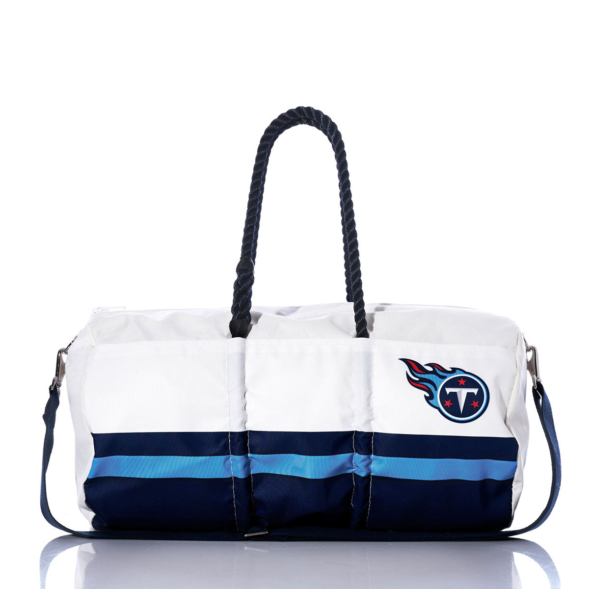 Sea Bags Tennessee Titans Duffel crafted from recycled sail cloth, featuring blue stripes, rope handles, a shoulder strap, and the Tennessee Titans logo in white and navy, displayed against a white background. by Sea Bags