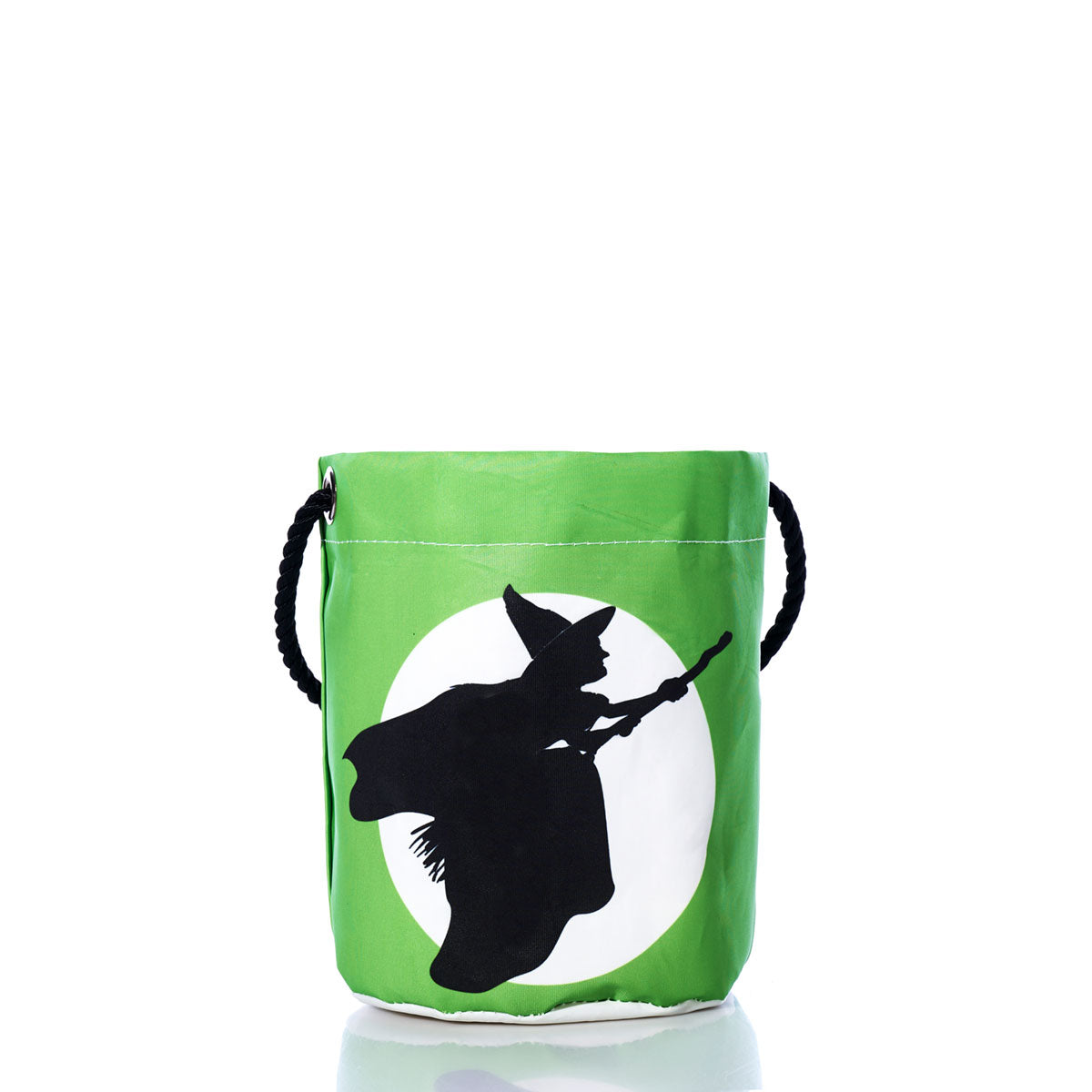 Introducing the Wicked Witch Bucket Bag from Sea Bags—a green bucket bag featuring a sturdy black rope handle and a striking black silhouette of a witch on a broomstick set within a white circle on the front. Crafted from recycled sails, this eco-friendly Halloween accessory blends spooky style with sustainable materials. by Sea Bags