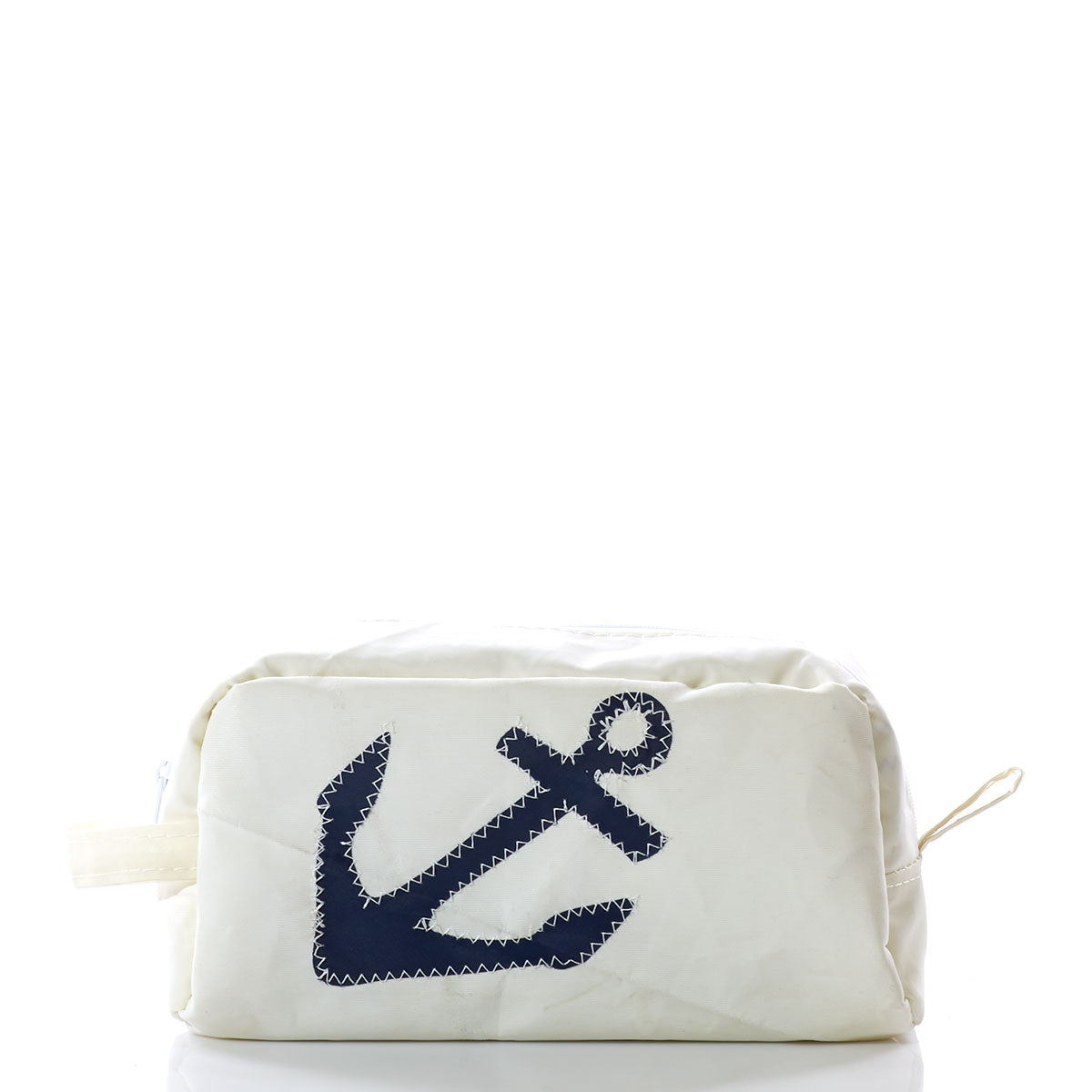 The Navy Anchor Toiletry Bag by Sea Bags is crafted from recycled sail bags, featuring a white fabric exterior with a dark blue anchor on the front and a classic zippered closure. The pouch is photographed against a white background. by Sea Bags