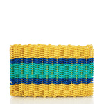 A rectangular woven clutch inspired by the Fisherman Rope Mat - Blue  Yellow Stripe from Custom Cordage / DBA Maine Rope Mats, featuring yellow edges, a bold central green stripe, and a narrower blue stripe reminiscent of the mat’s distinctive blue and yellow pattern, displayed against a white background. by Sea Bags
