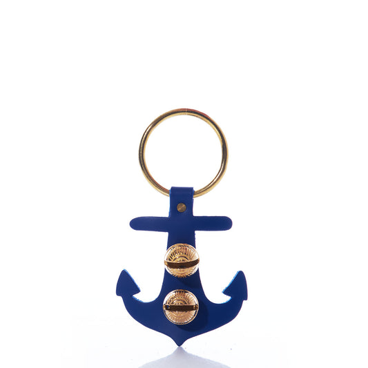 The Navy Anchor Door Chime by true features a gold keyring and a blue nautical anchor-shaped charm adorned with two gold buttons on the anchor’s arms, evoking classic brass bells, and is displayed against a white background.