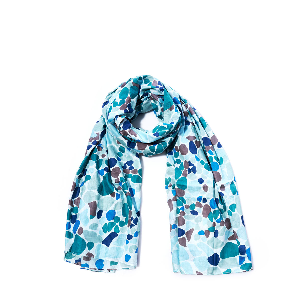The Sea Glass Scarf by Batela USA Inc, featuring a lightweight cotton fabric with a blue, teal, and gray abstract pattern inspired by sea glass, is displayed flat on a white background—bringing nautical charm to any outfit. by Sea Bags